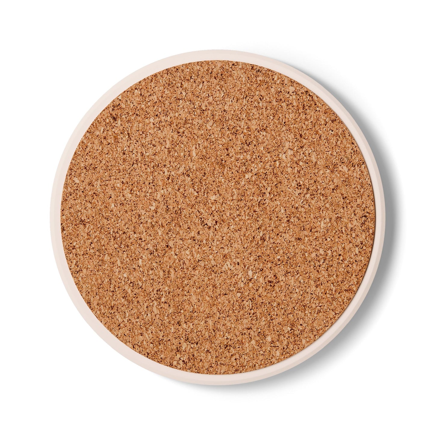 Rear view of the round ceramic coaster showing the textured, non-slip natural brown cork backing.