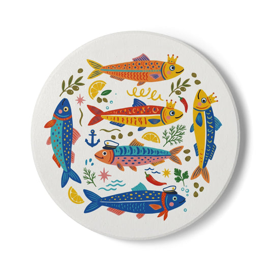 Straight-on front view of a round white ceramic coaster featuring a vibrant, colorful sardine fish pattern design.
