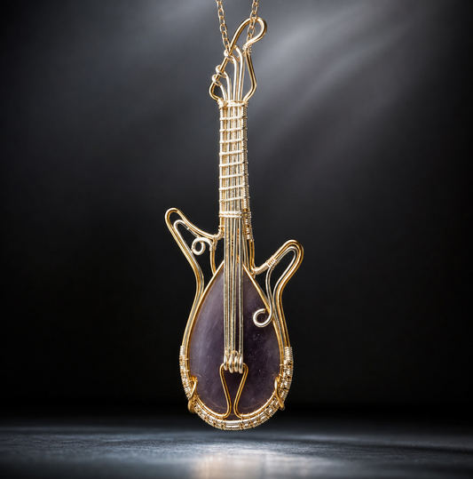 A detailed handcrafted wire-wrapped electric guitar pendant featuring a teardrop-shaped purple-grey agate gemstone body and woven metal strings, resting vertically on raw quartz crystals.
